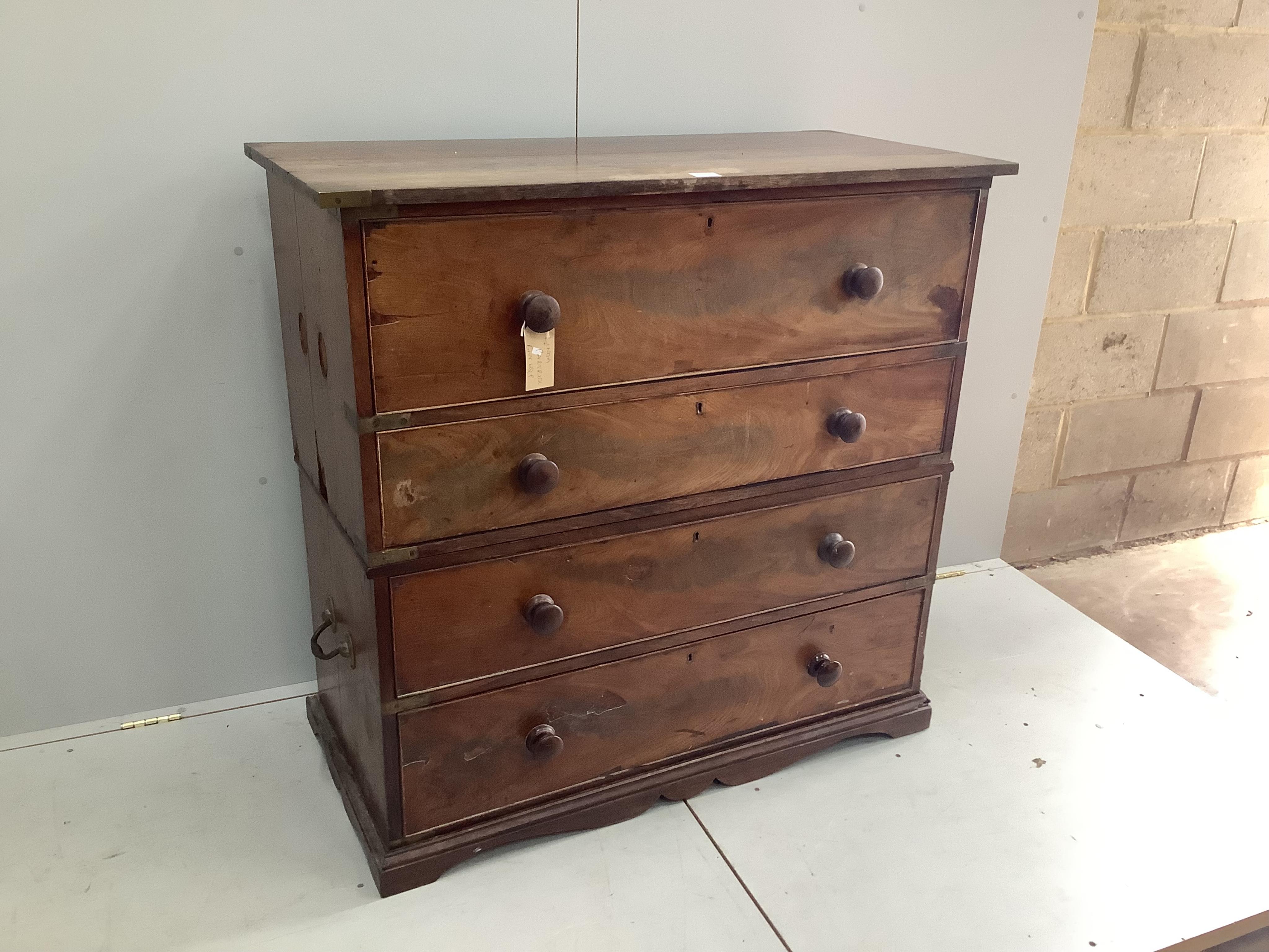 A 19th century hardwood two section military chest, the top drawer fitted as a secretaire, width 114cm, depth 54cm, height 111cm. Condition - poor